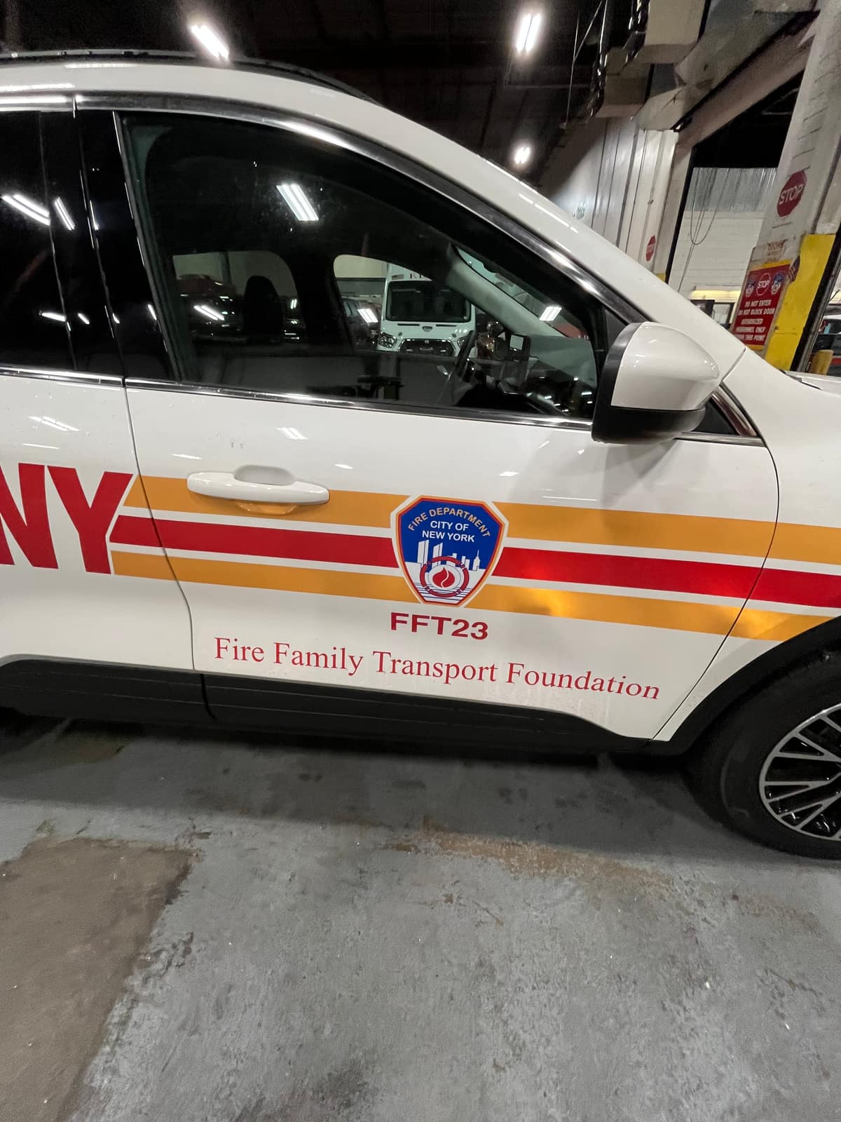FDNY fleet vehicle door decal with striping and agency seal