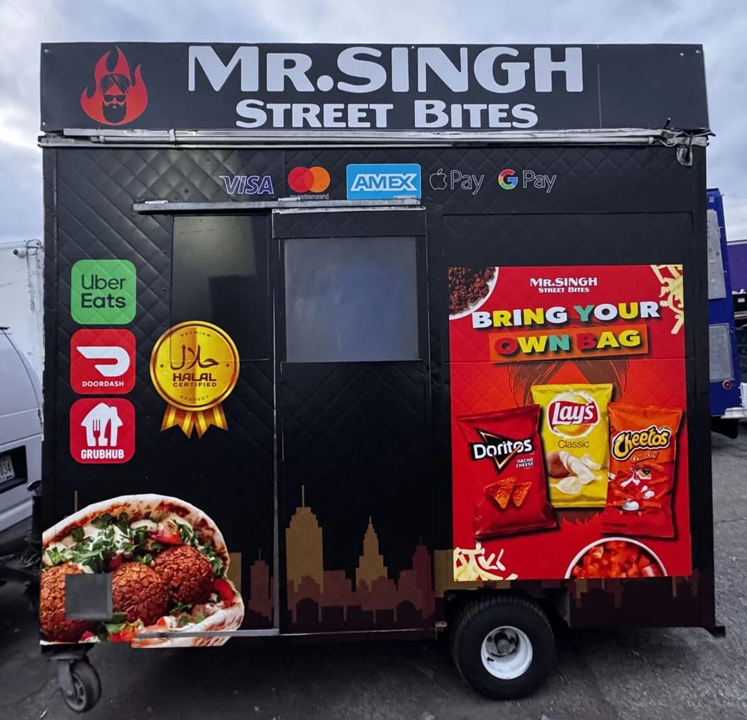 Mr. Singh Street Bites cart, service side with the window, chip panel and food photography